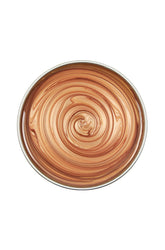 Top view of a can of Satin Smooth Golden Quartz Wax with no lid featuing its glossy honey-like color